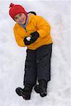 Portrait of a girl holding a snowball