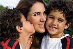 Close-up of a mid adult woman with her two sons