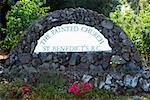 Text written on a wall outside a church, St. Benedict's Catholic Church, Honaunau, Hawaii Islands, USA