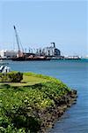 Military ship and a crane at a commercial dock, Pearl Harbor, Honolulu, Oahu, Hawaii Islands, USA