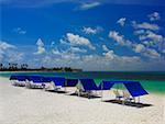 Chairs and lounge chairs under the tents on the beach, Spratt Bight Beach, San Andres, Providencia y Santa Catalina, San