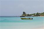 Boat in the sea, West Bay Beach, Roatan, Bay Islands, Honduras