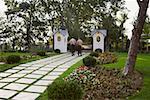 Rear view of two men moving towards a gate, Istanbul, Turkey