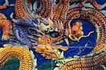 Close-up of a Chinese dragon carved on a wall, Beijing, China