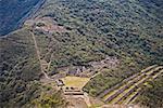 High angle view of ruins of buildings on mountains, Choquequirao, Inca, Cusco Region, Peru