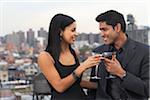 Couple Drinking Wine on Balcony, Soho, New York City, New York, USA