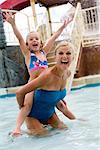 Grandmother and Granddaughter Playing at the Water Park