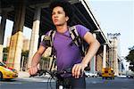 Teenaged Boy on Bicycle