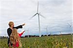 Mother and Daughter Looking at Wind Turbines, Denmark