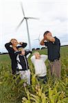 Family Covering Ears near Wind Turbines, Denmark