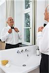 Man Getting Dressed, Adjusting Bow Tie