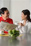 Mature couple at home having coffee