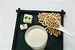 Still life of soya milk and soya beans