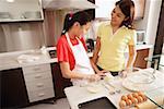 Mother and daughter in kitchen