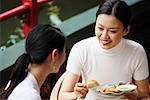 Women in cafe, eating