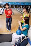 Women in bowling alley