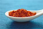 Close-up of spoon with chili powder