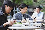 Business people at outdoor café