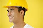 Man wearing hardhat, smiling, head shot