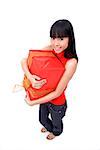 Young woman hugging big red gift box