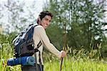 Young man hiking in the wilderness