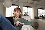 Woman in Chair with Laptop Computer