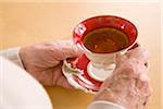 Woman's Hands with Tea Cup