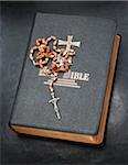 Rosary on Bible