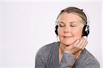 Mature Woman Wearing Headphones