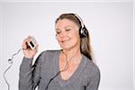 Woman Listening to MP3 Player