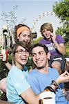 Teenagers hanging out in amusement park