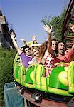 Teenagers on amusement park ride