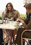 Two women at a meeting at a cafe table