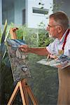 Mature Man Painting Picture