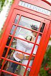 Couple Kissing in Phone Booth, Newport Beach, Orange County, California, USA