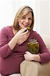 Pregnant Woman Eating Pickles