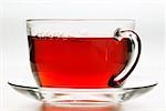 Hot hibiscus tea in glass cup