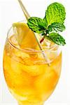 Cold peppermint tea with fresh mint and lemon