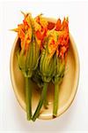 Courgette flowers in a bowl