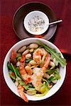 Bean stew with shrimps and rocket