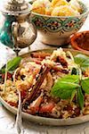 Couscous mit Huhn, Trockenfrüchte, Mandeln und Zimt