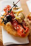 Crostini with seafood and dried tomatoes