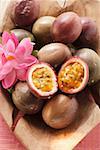 Passion fruits (Purple granadilla) in wooden bowl