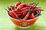 Red chili peppers in Asian bowl