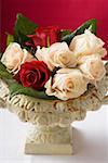 Roses in romantic stone bowl