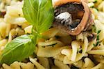 Fusilli with sardines and basil (close-up)