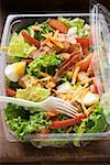 Salad leaves with vegetables, egg cheese & bacon to take away