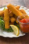 Fish fingers with lemon and ketchup