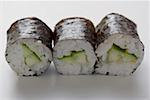 Three maki sushi with cucumber