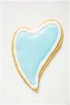 Heart-shaped biscuit with pale blue icing